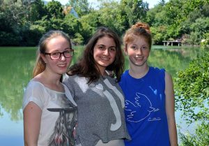 Students girls in a wonderful park during breaktime