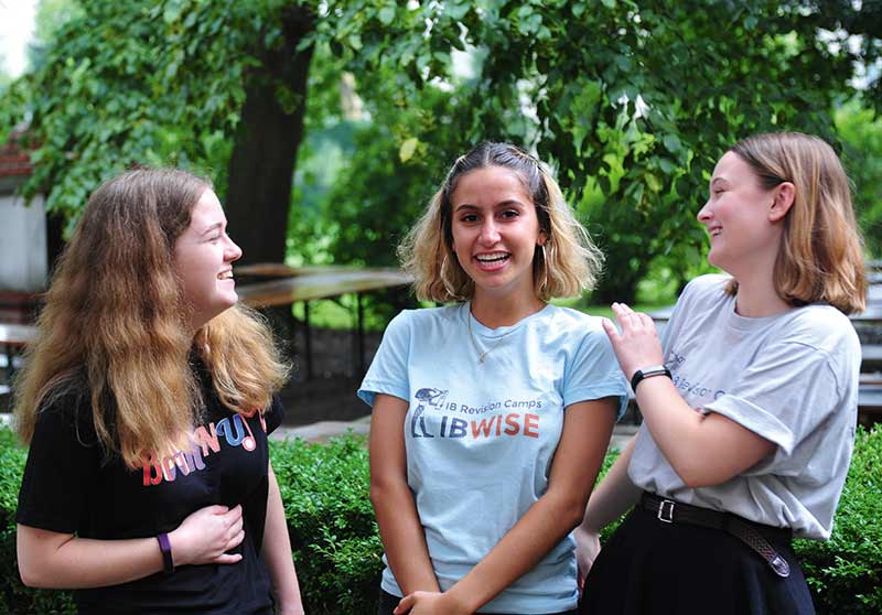 Summer Interns in a campus park