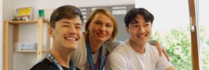 Two students and their camp counselor during an IB Revision Camp