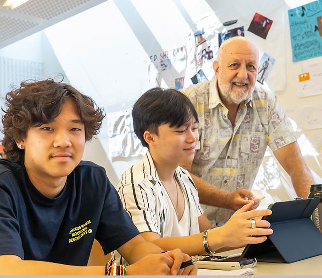 A teacher and students in a class room